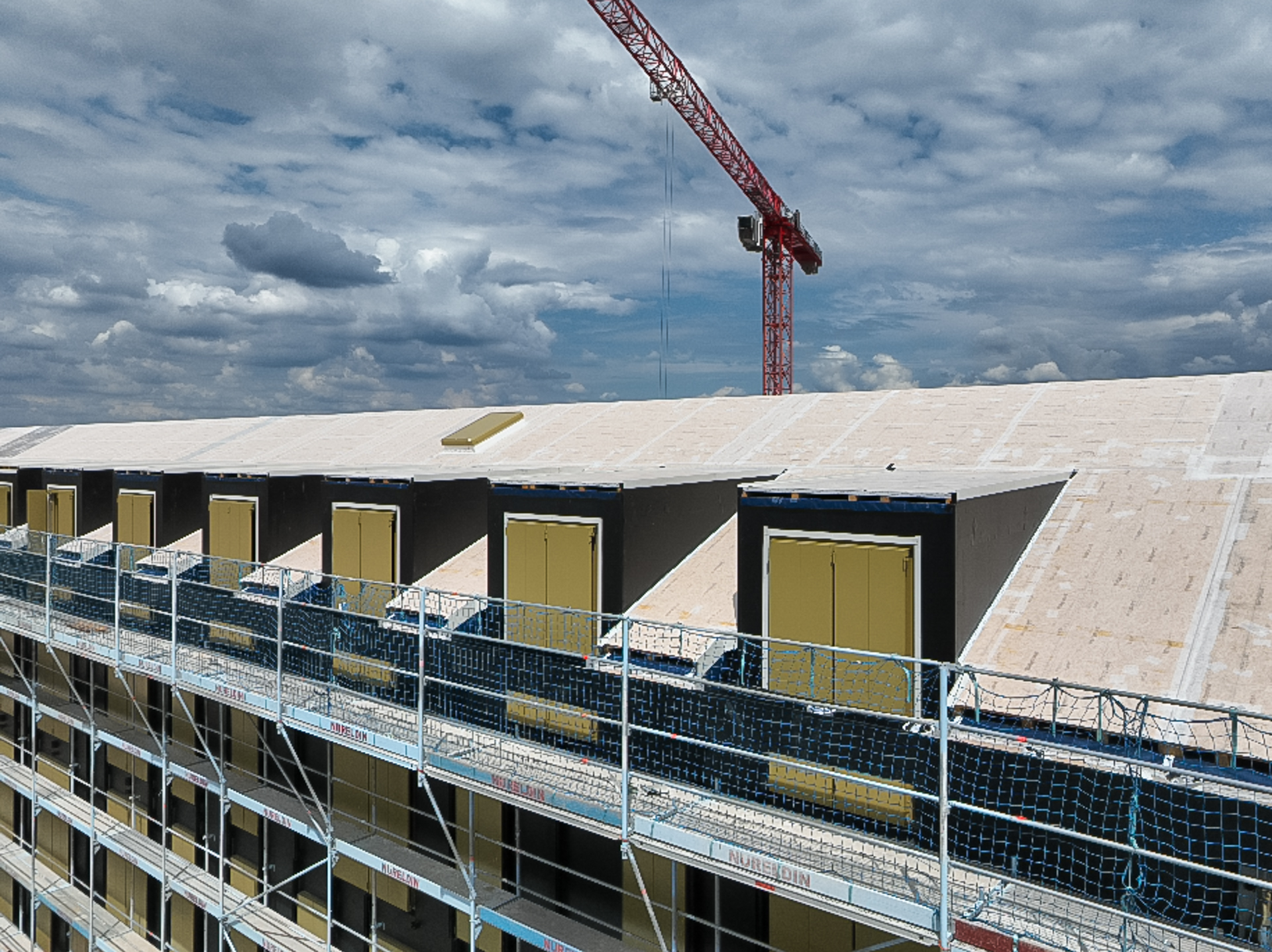 Mit dem planmäßigen Abschluss unserer Montagearbeiten endet für Holzunion ein entscheidender Abschnitt im Projekt „Grüne Mitte“. Leistung: Fassaden- und Dachelemente